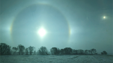 A sundog, a ring of light around the sun in the winter time.