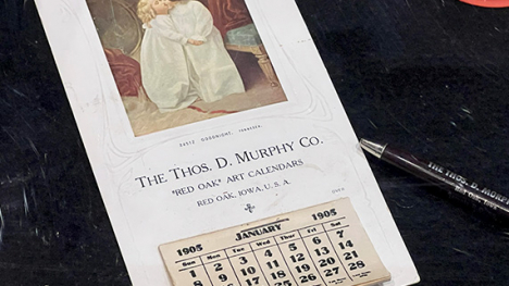 A paper calendar with a picture.