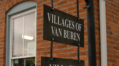 A sign that reads "Villages of Van Buren".