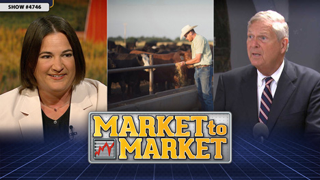 Elaine Kub, a cattleman, and Sec. Tom Vilsack