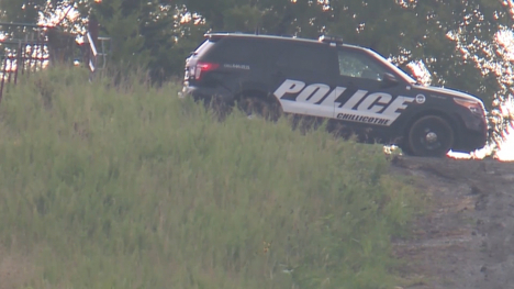 A police officer's vehicle at the Missouri farm where two men were murdered.