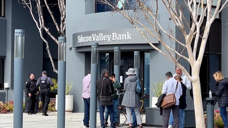 Customers line up outside Silicon Valley Bank, which failed last week.