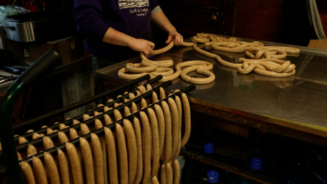 sausages being stuffed