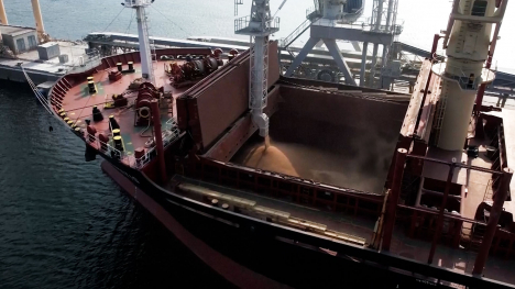 grain being loaded into ship