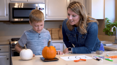 pumpkin study with Abby Brown and child