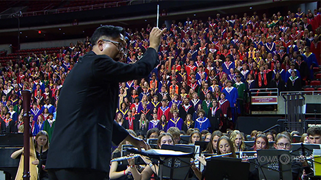 2023 All-State Music Festival - a music conductor in front of the music groups.