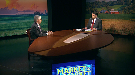 Arlan Suderman and Paul Yeager at the Market to Market desk.