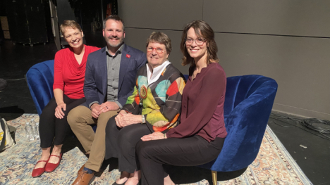 The panelists and Charity Nebbe sitting on a couch at the Caregiving event