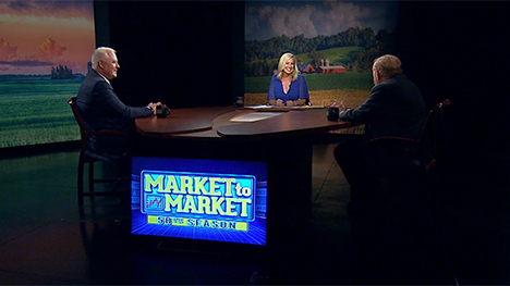 Chris Robinson, Brooke Kohlsdorf, and Ernie Goss at the Market to Market desk.