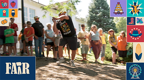 A man participates in the cow chip throwing contest at the Iowa State Fair.