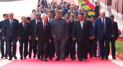 Putin, XI and Kim walk together in Beijing,
