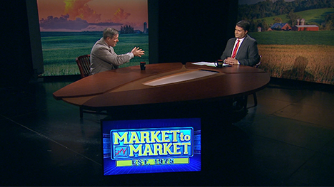 Shawn Hackett and Paul Yeager at the Market to Market desk.