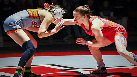 Two women college wrestlers.
