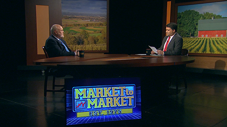 Dan Hueber and Paul Yeager at the Market to Market desk.