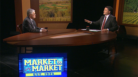 Arlan Suderman and Paul Yeager at the Market to Market desk.