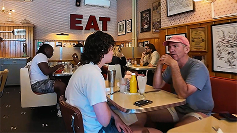 Patrons sit at tables inside the Hamburg Inn No. 2.