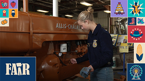 FFA member Mackenzie Olsen works on her tractor.