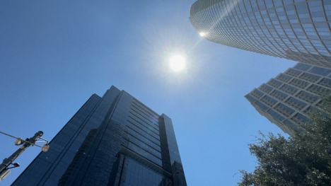 Sun in sky buildings
