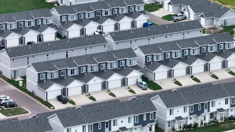 Aerial view of rows of townhomes with attached garages in Harrisburg, South Dakota.